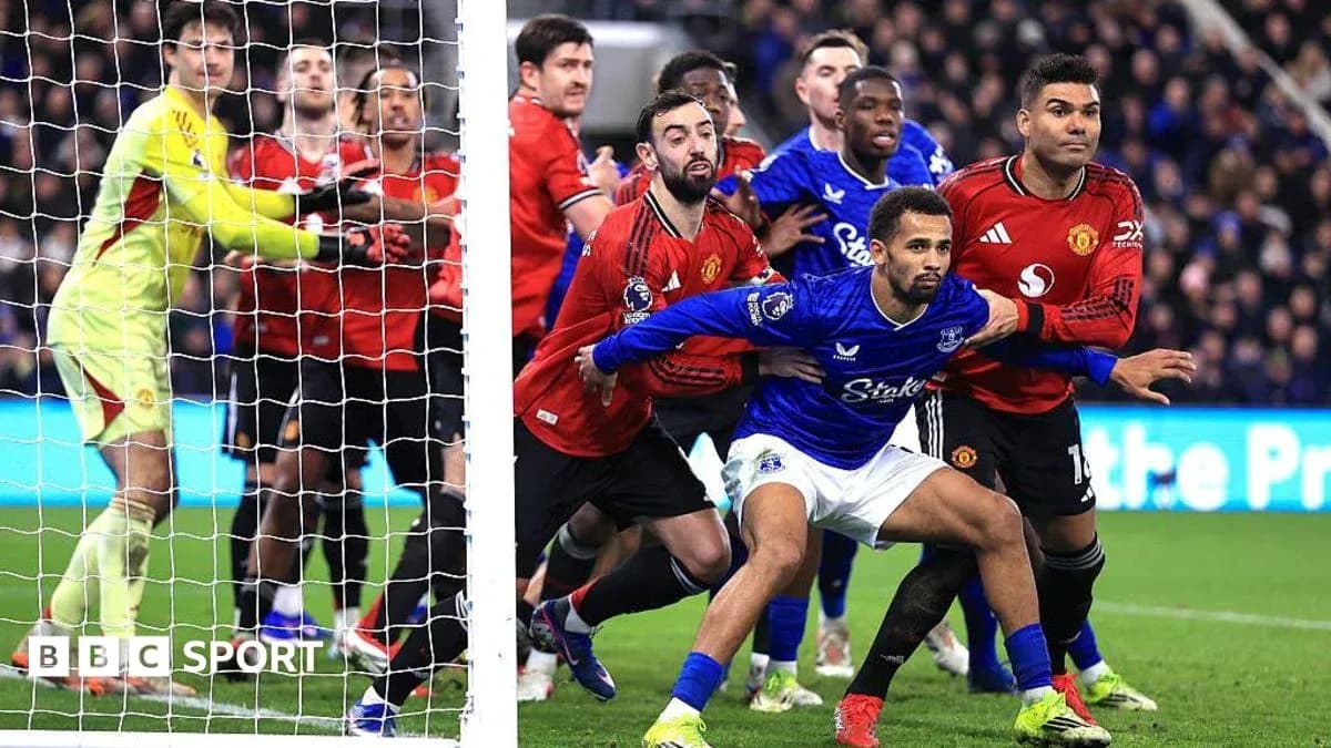 Everton and Manchester United players in penalty area Everton and Manchester United players in penalty area
