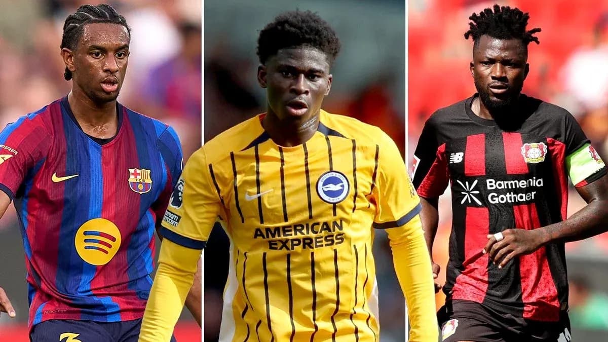Three football players in club jerseys during match Three football players in club jerseys during match