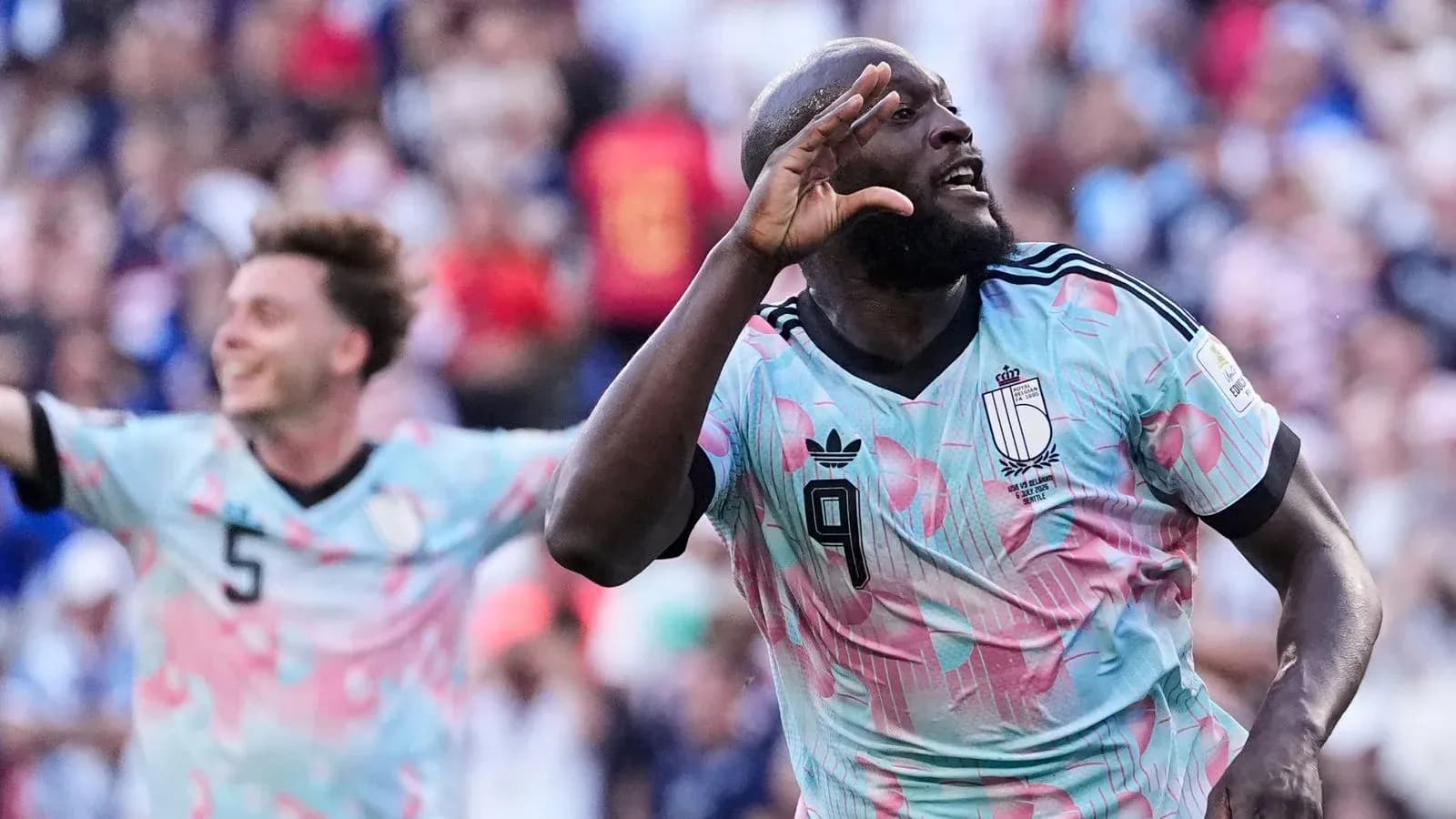 Rombolo Lukaku celebrating with teammates during match Rombolo Lukaku celebrating with teammates during match