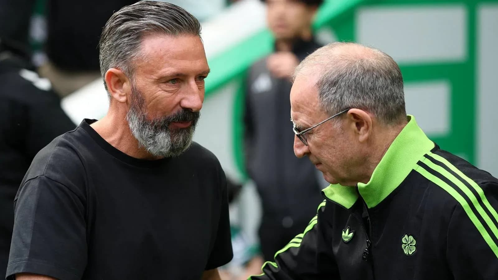 Two coaches speaking before a match Two coaches speaking before a match