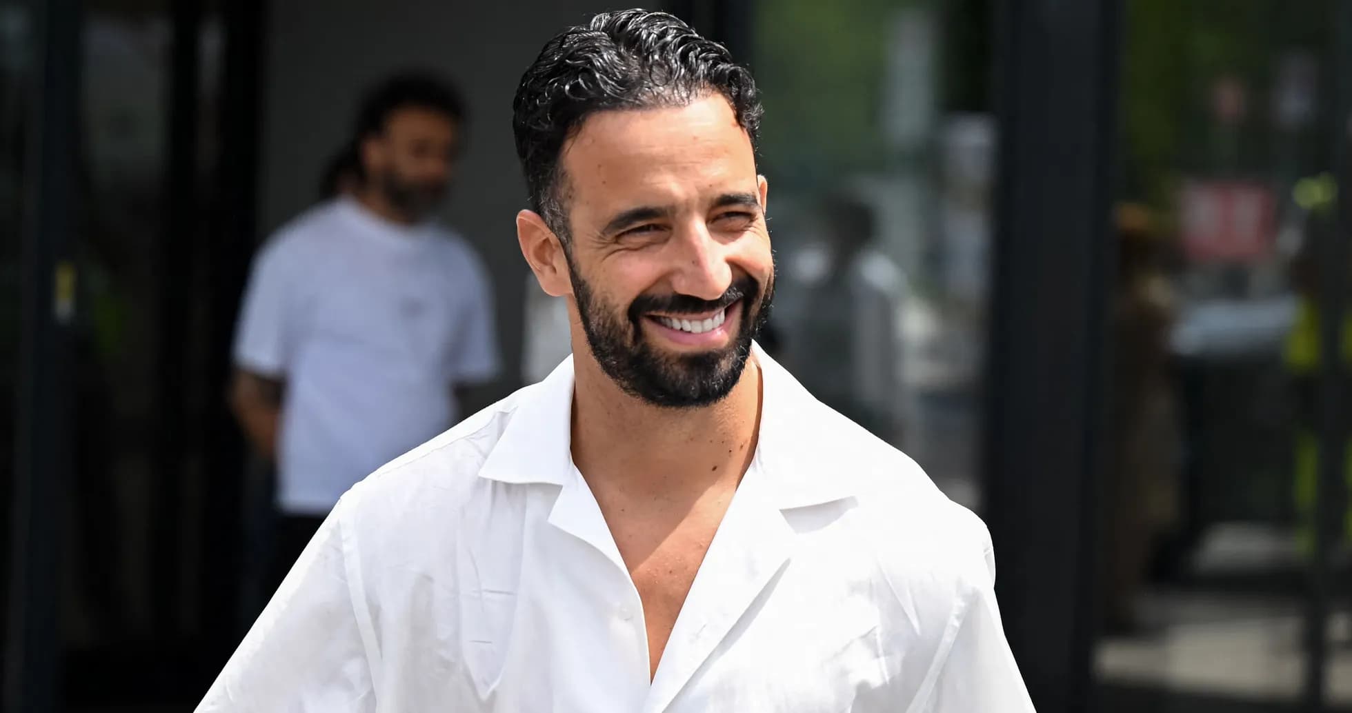 Shirtless man smiling in a white shirt Shirtless man smiling in a white shirt