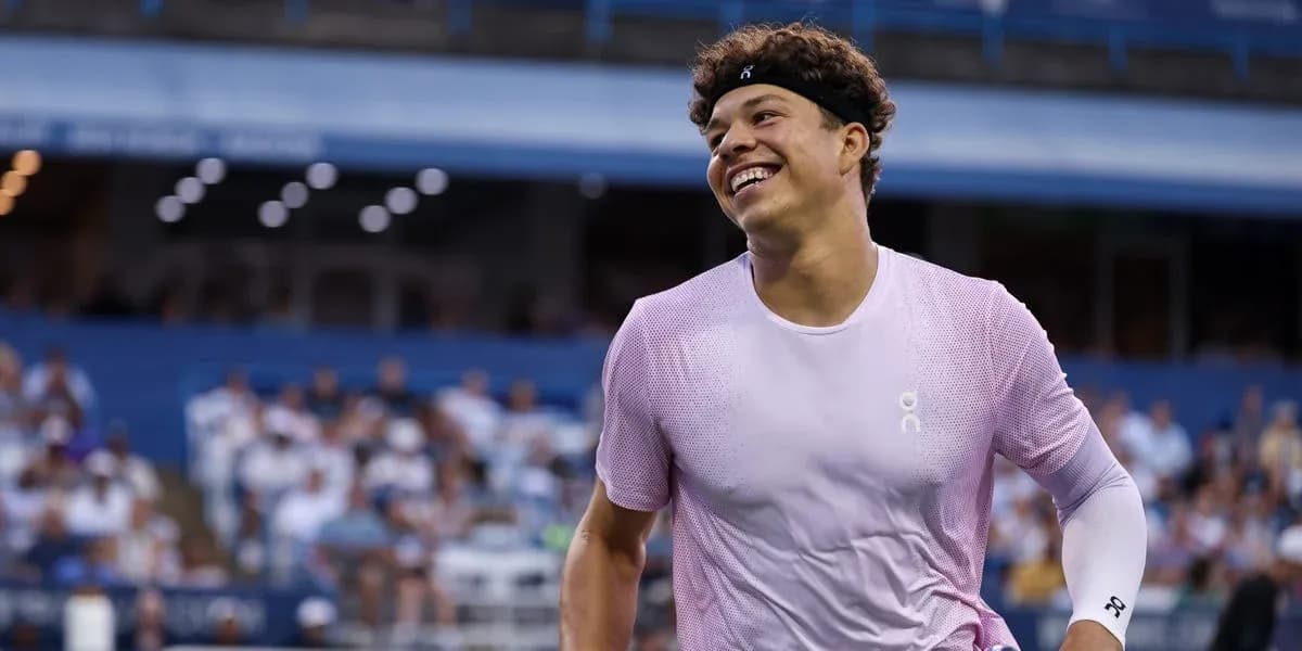 Tennis player smiling during match at stadium Tennis player smiling during match at stadium