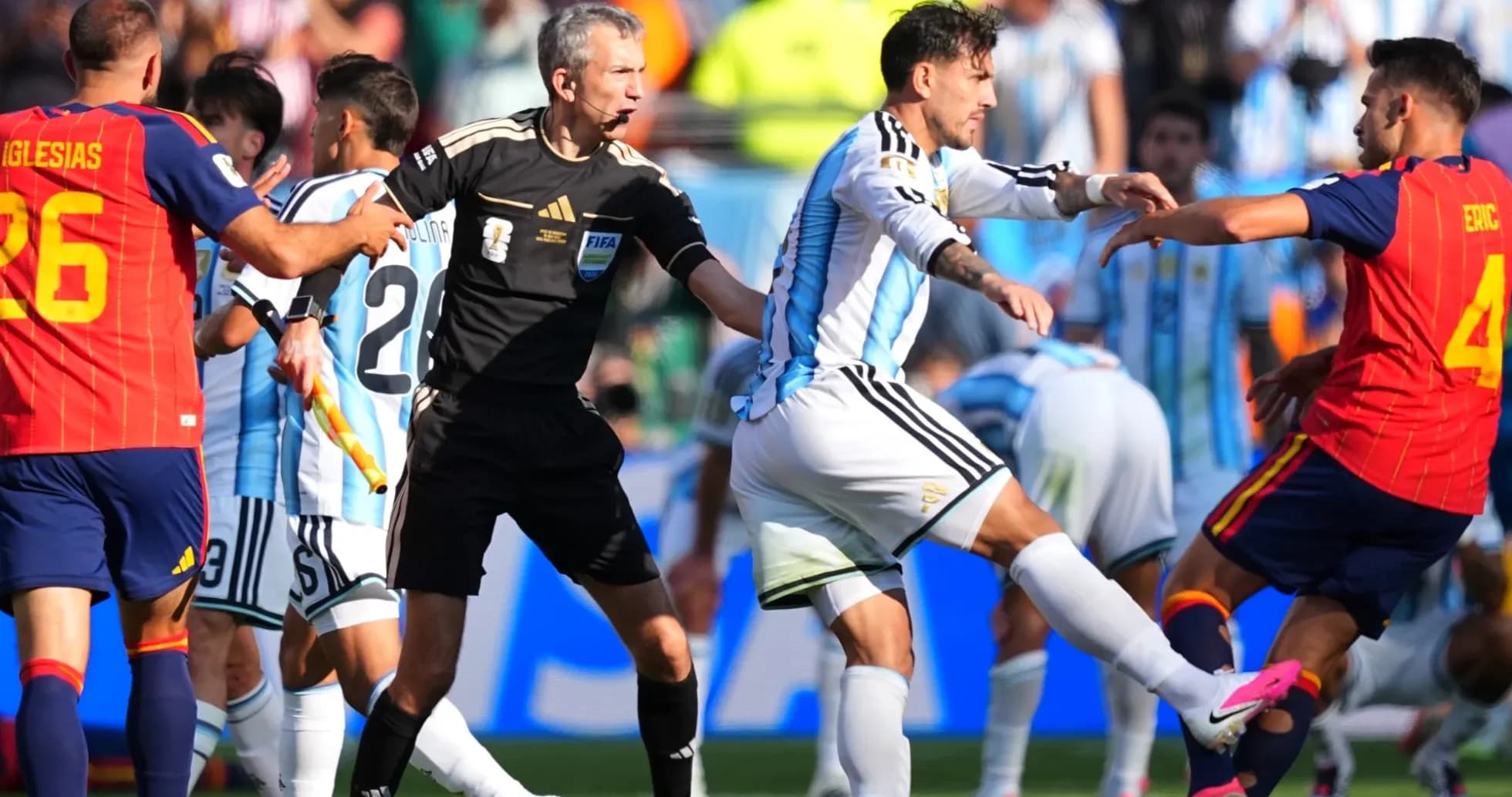 Players clashing during a tense moment in match Players clashing during a tense moment in match