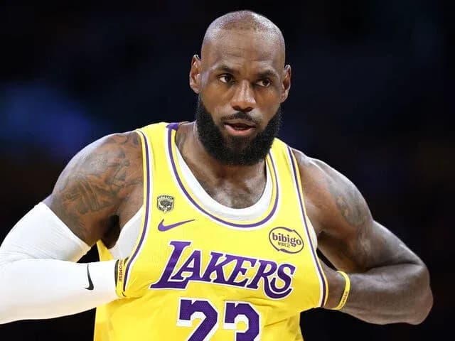 LeBron James in Lakers jersey during game LeBron James in Lakers jersey during game