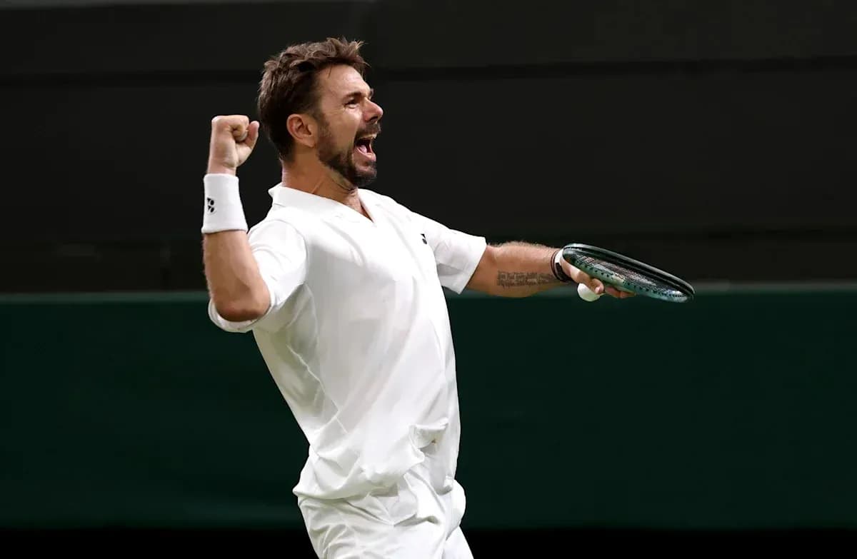 Tennis player celebrating with racket during match Tennis player celebrating with racket during match