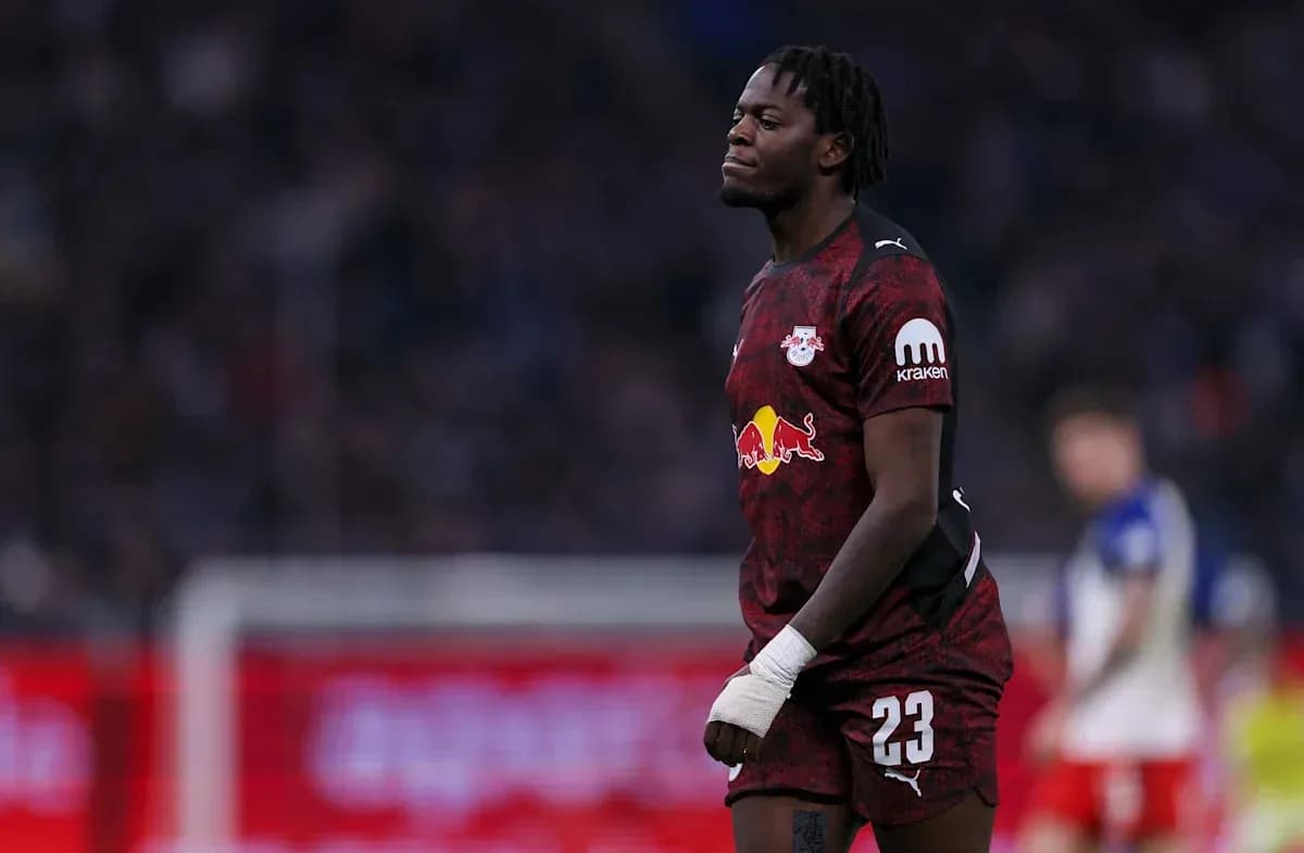 Goalkeeper in RB Leipzig kit walking on field Goalkeeper in RB Leipzig kit walking on field
