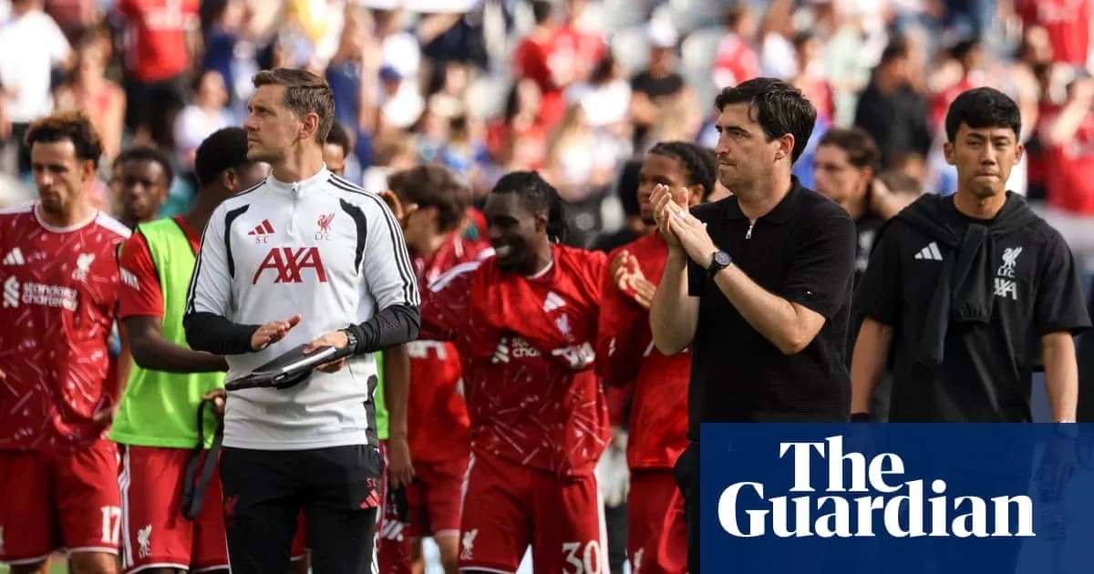 Liverpool players and staff applauding fans post-match Liverpool players and staff applauding fans post-match
