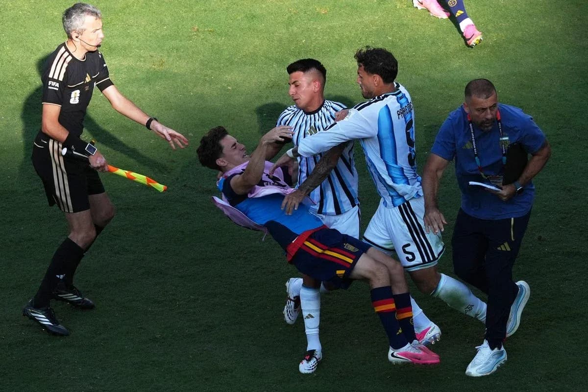 Players clashing during a heated moment in match Players clashing during a heated moment in match