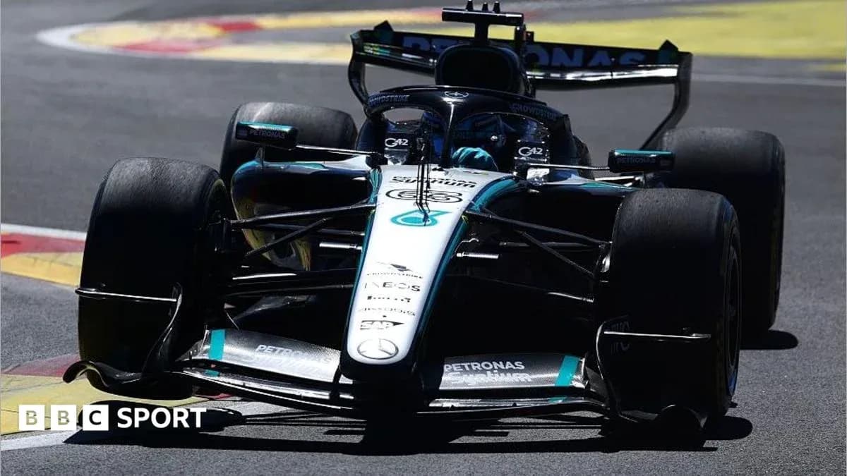 Mercedes Formula 1 car racing on track Mercedes Formula 1 car racing on track