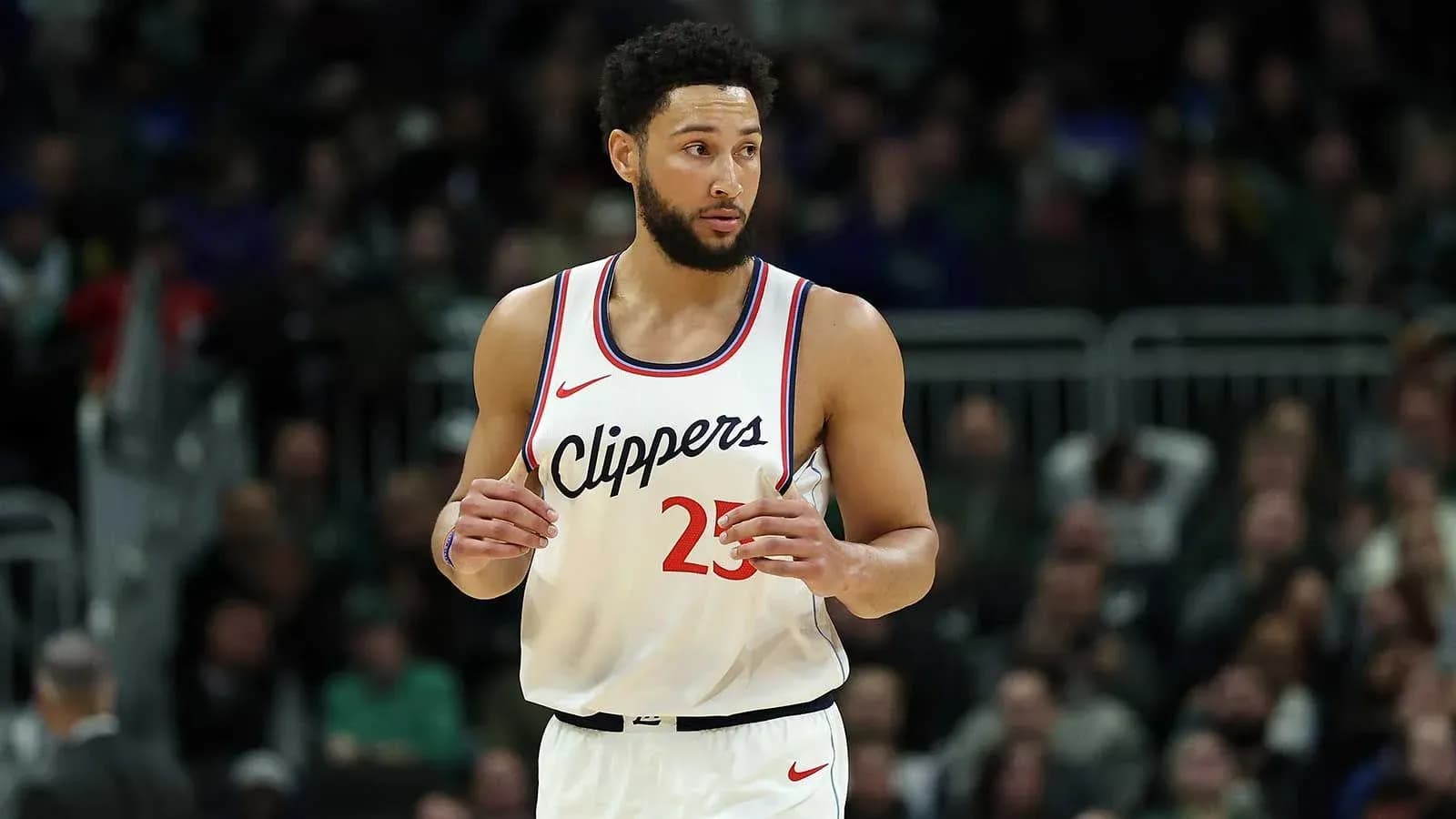 Basketball player in Clippers uniform during game Basketball player in Clippers uniform during game