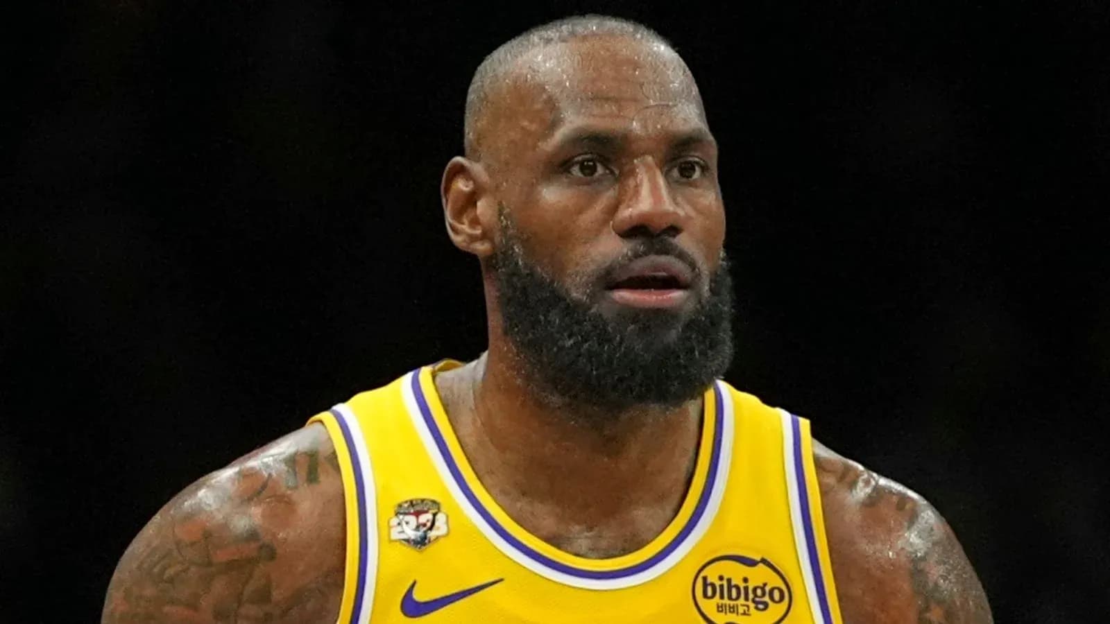 Basketball player in Lakers uniform during game Basketball player in Lakers uniform during game