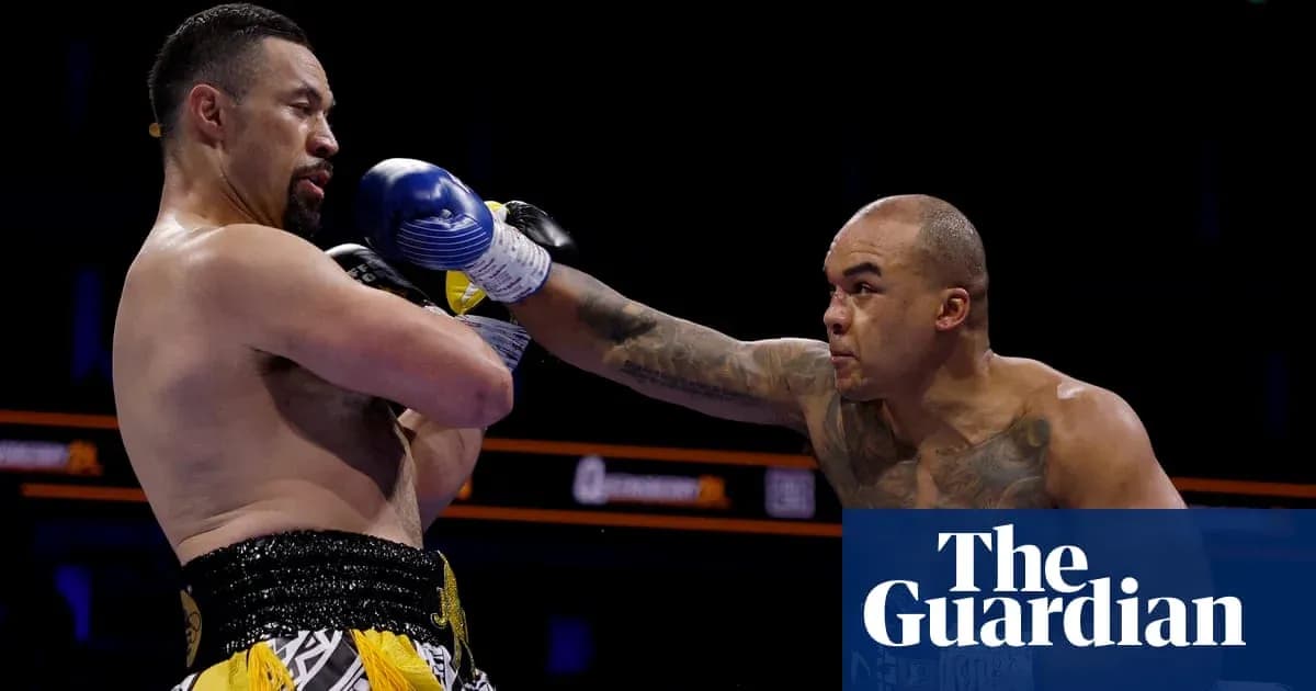 Two boxers exchanging punches in the ring Two boxers exchanging punches in the ring