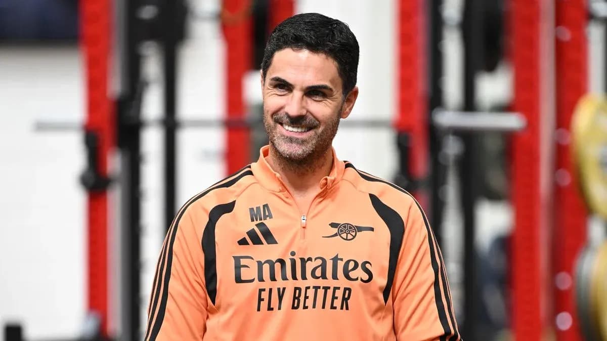 Mikel Arteta smiling during training session Mikel Arteta smiling during training session