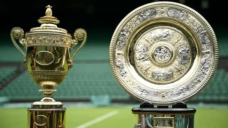 Wimbledon trophies displayed on the court Wimbledon trophies displayed on the court