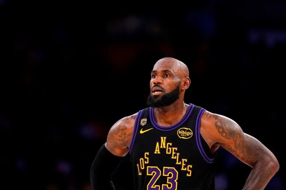 LeBron James in Los Angeles Lakers uniform on court LeBron James in Los Angeles Lakers uniform on court