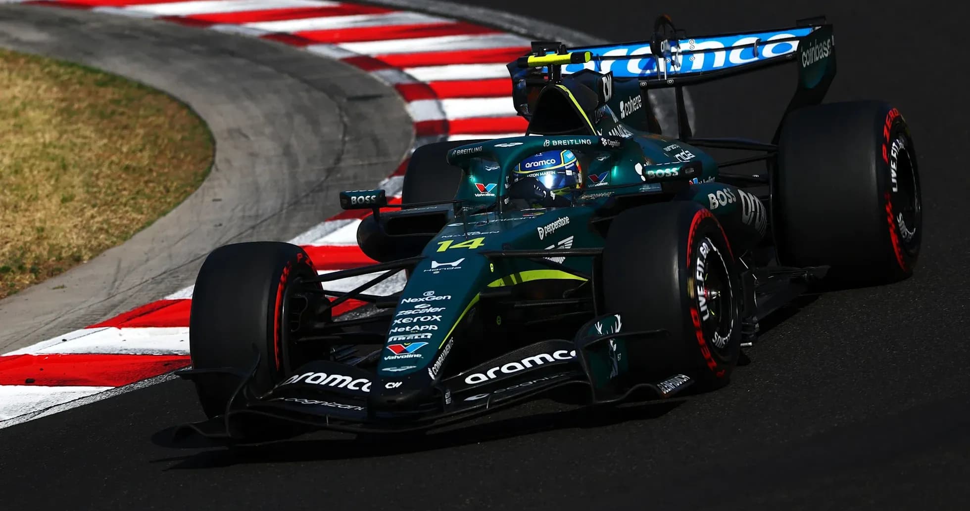 Formula 1 car navigating a sharp turn on track Formula 1 car navigating a sharp turn on track