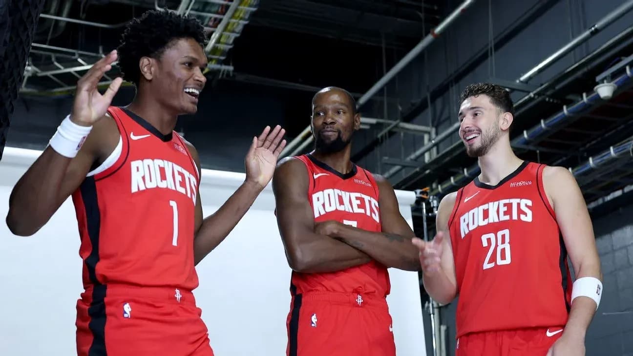 Three players in Houston Rockets jerseys posing together Three players in Houston Rockets jerseys posing together