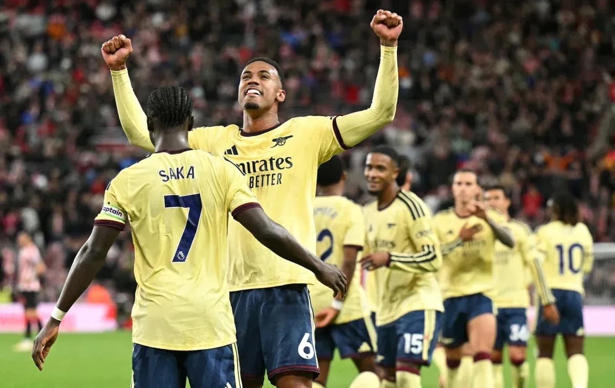 Arsenal players celebrating after scoring a goal Arsenal players celebrating after scoring a goal