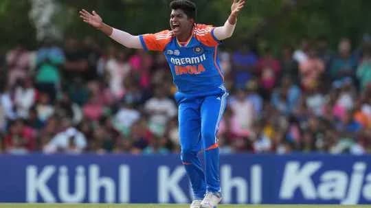 Bowler appealing during cricket match with crowd behind Bowler appealing during cricket match with crowd behind