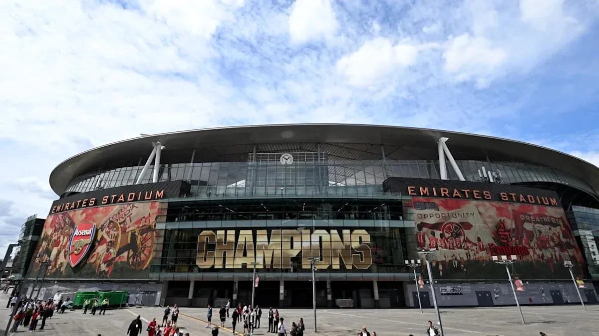 Emirates Stadium exterior with 'CHAMPIONS' sign Emirates Stadium exterior with 'CHAMPIONS' sign