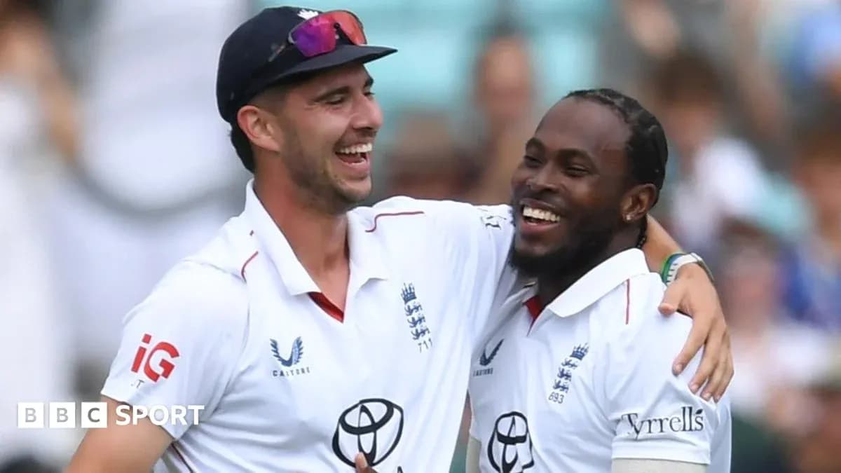 Two cricketers celebrating during a match Two cricketers celebrating during a match