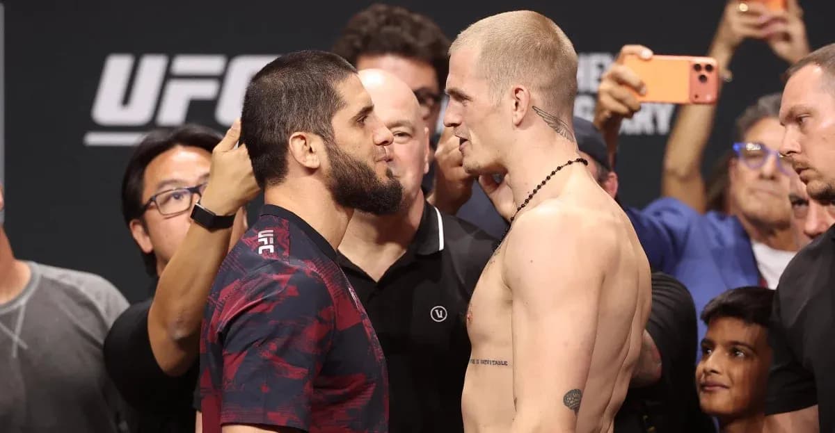 UFC fighters facing off during weigh-in event UFC fighters facing off during weigh-in event
