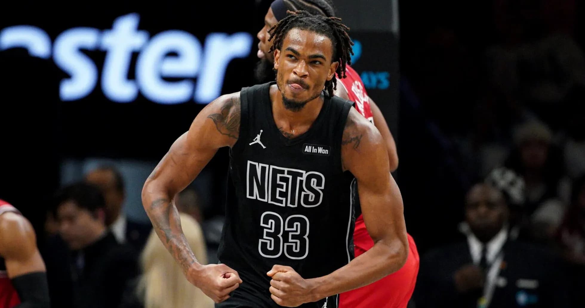 Basketball player celebrating during game action Basketball player celebrating during game action