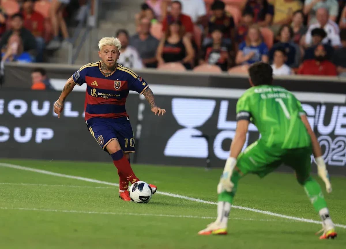 Player dribbling towards goal during match action Player dribbling towards goal during match action