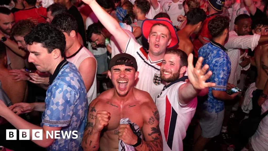 Fans celebrating in a crowded venue Fans celebrating in a crowded venue