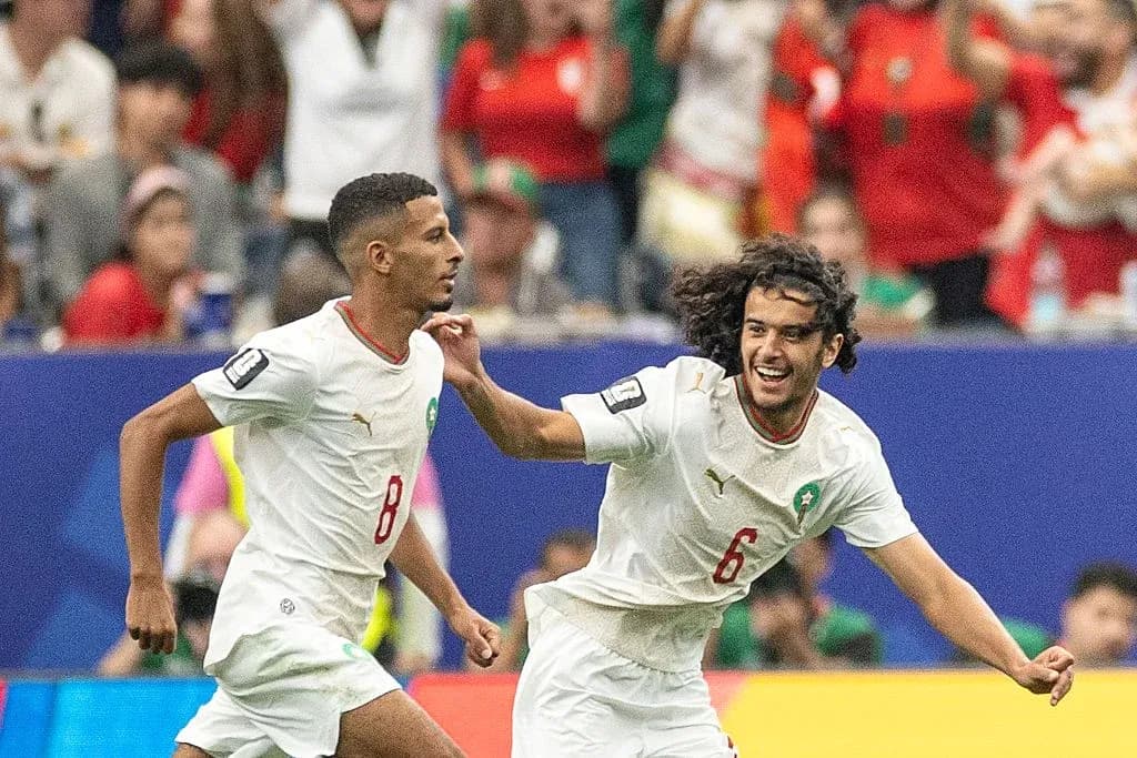Moroccan players celebrating during a match Moroccan players celebrating during a match