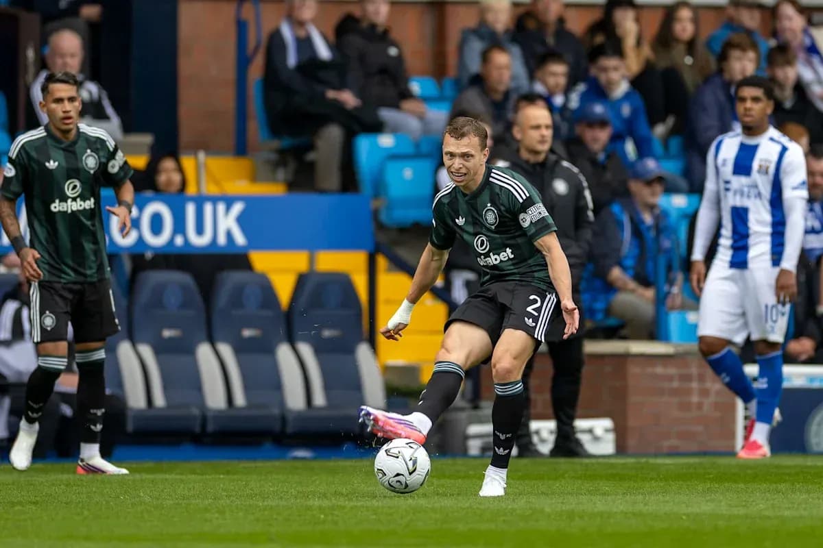 Player kicking ball during football match Player kicking ball during football match