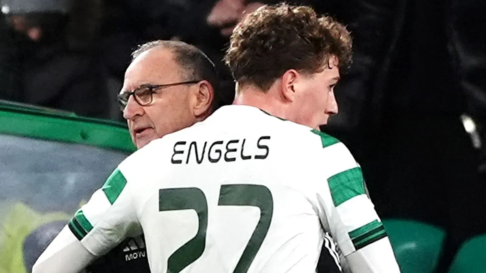 Coach discussing with player Engels during match Coach discussing with player Engels during match