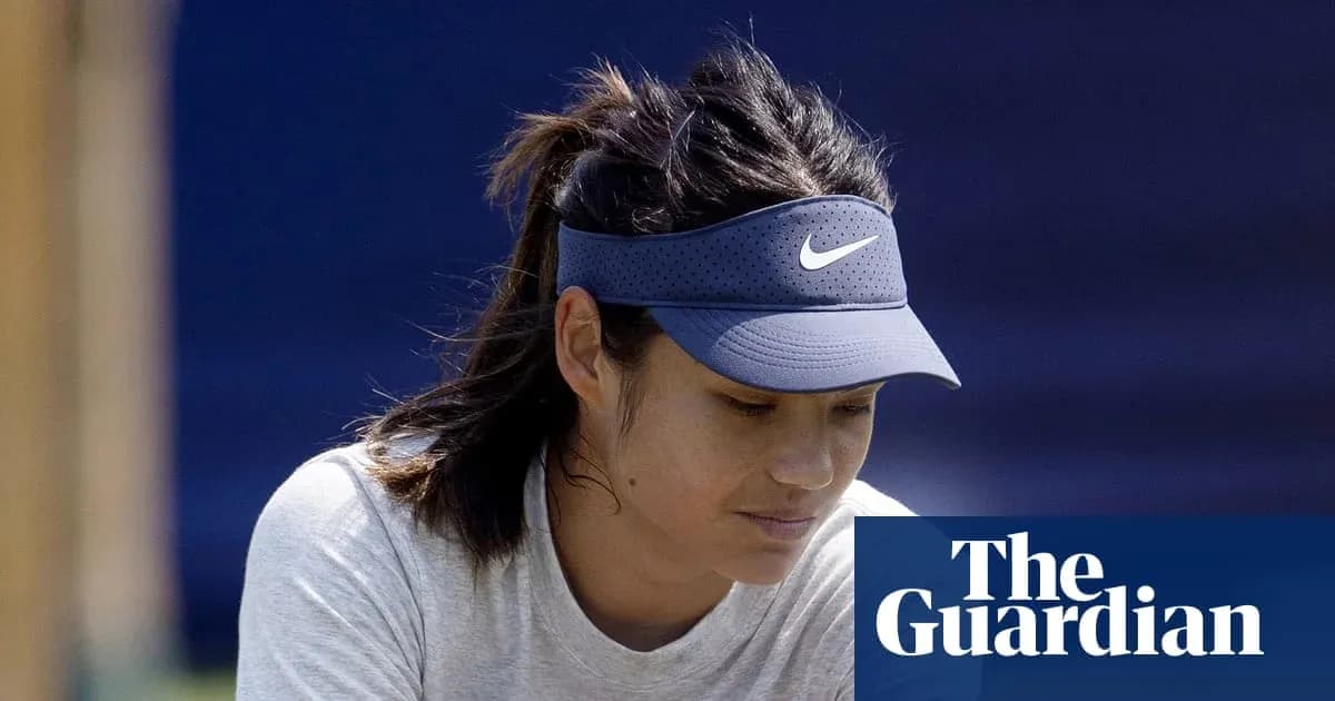 Tennis player wearing visor during training session Tennis player wearing visor during training session
