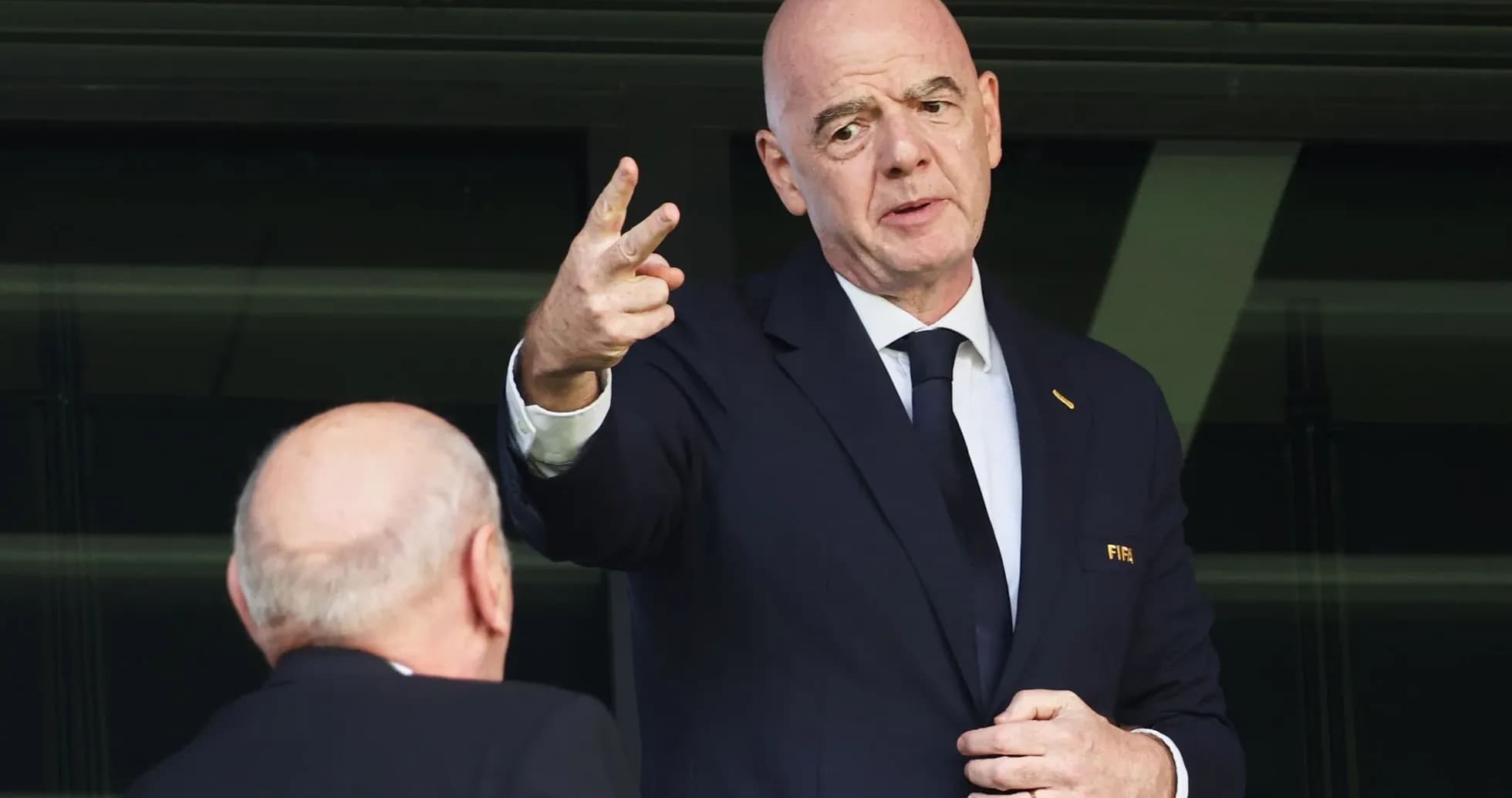 FIFA president speaking at event with colleague FIFA president speaking at event with colleague