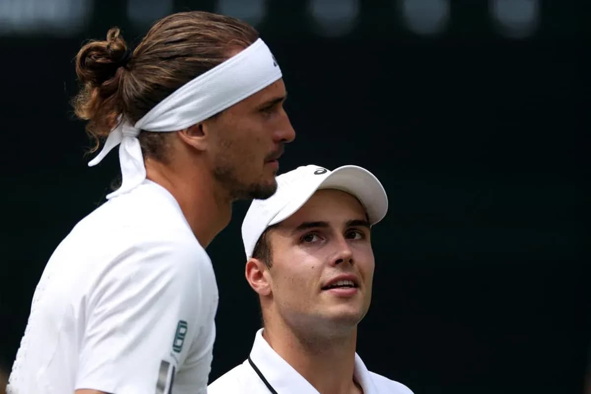Tennis players discussing during match at Wimbledon Tennis players discussing during match at Wimbledon