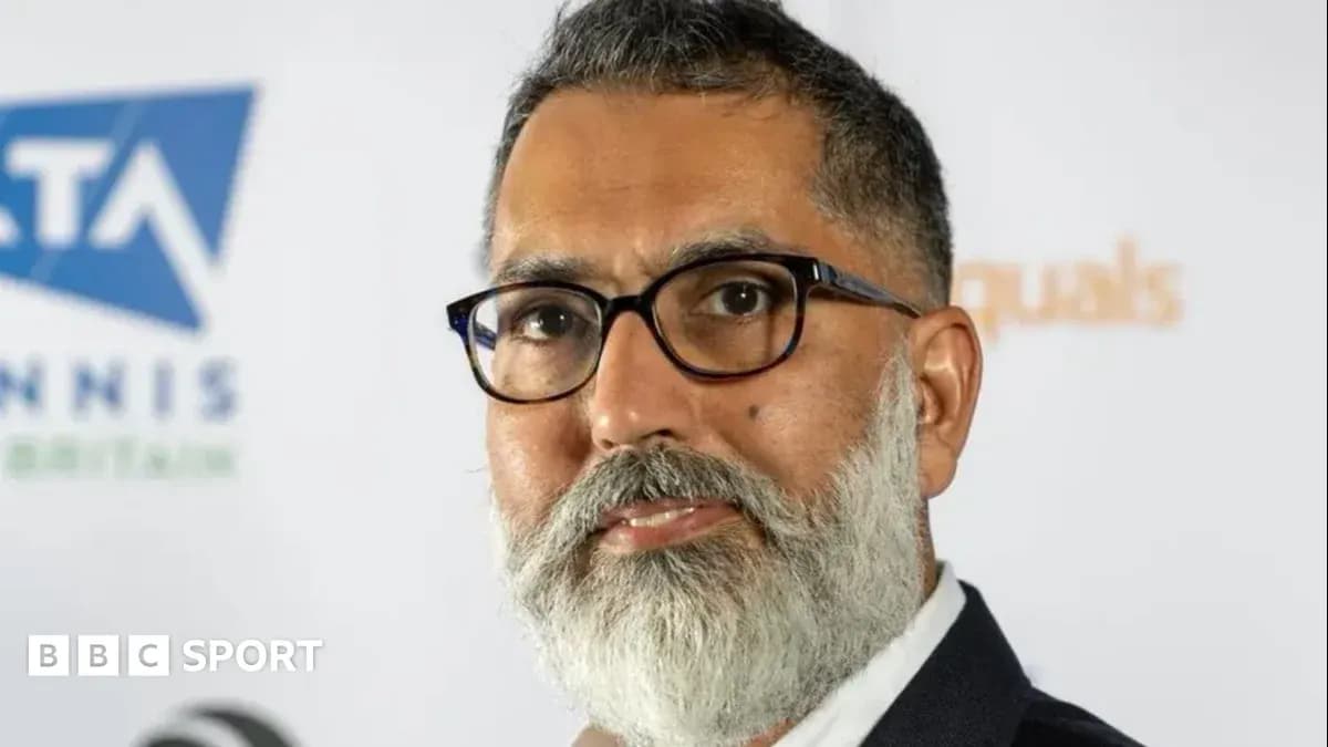 Man with glasses and beard posing for photo Man with glasses and beard posing for photo