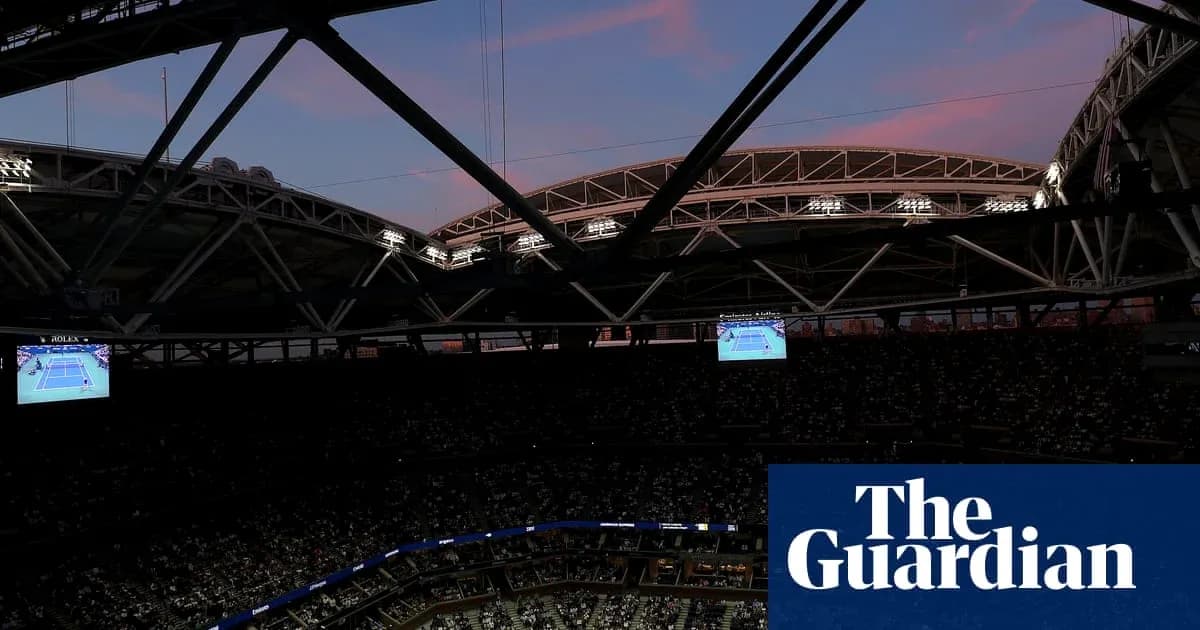 Tennis match displayed on screens in stadium Tennis match displayed on screens in stadium