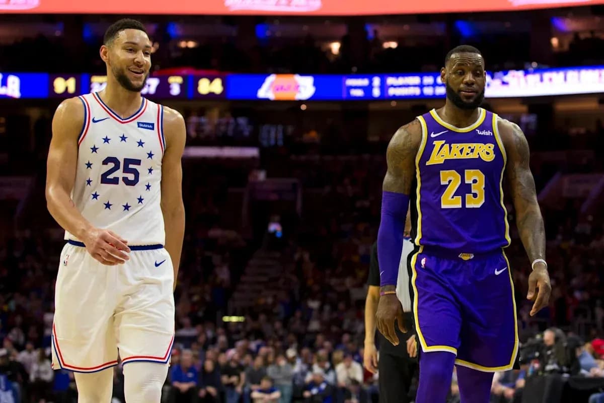 Ben Simmons and LeBron James walking on court Ben Simmons and LeBron James walking on court