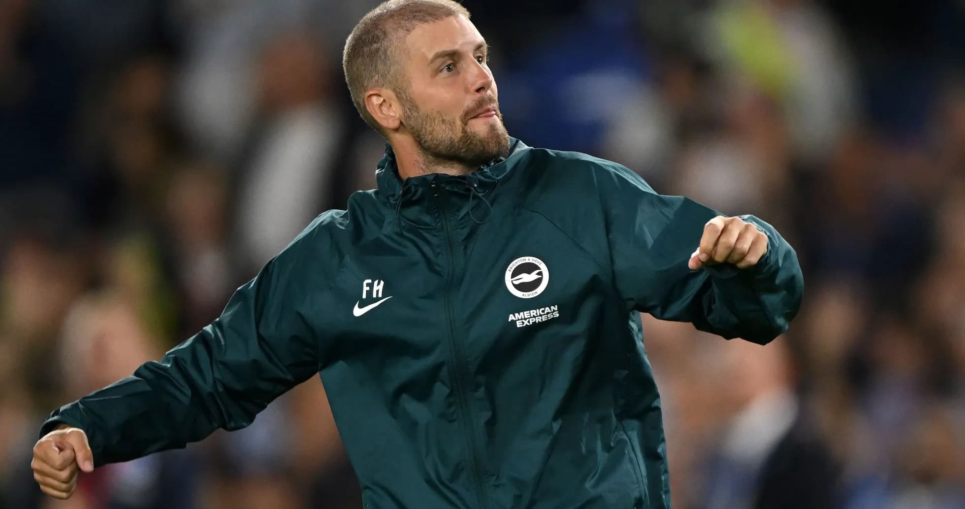 Coach celebrating on the sidelines during match Coach celebrating on the sidelines during match