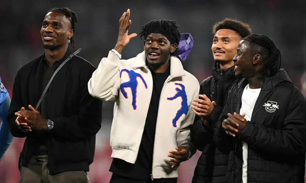 Four players celebrating together in stadium Four players celebrating together in stadium