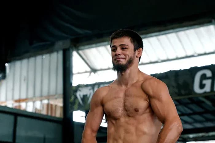 Jiu-jitsu athlete training in gym environment Jiu-jitsu athlete training in gym environment
