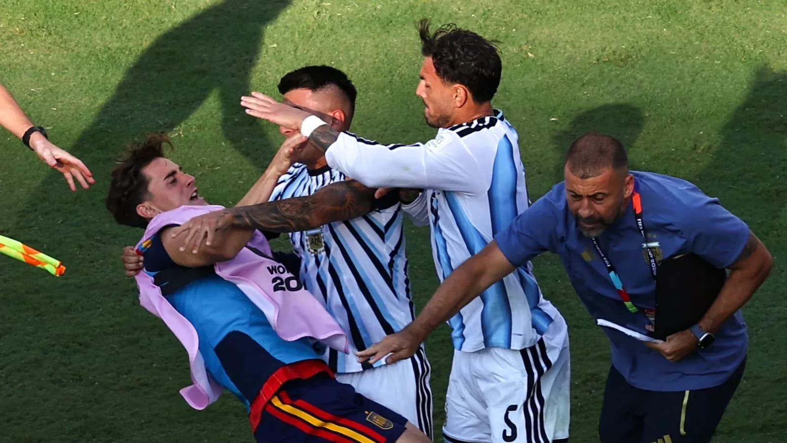 Argentinian players celebrating on the pitch Argentinian players celebrating on the pitch