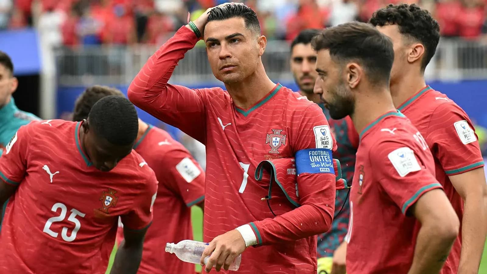 Portugal players discussing during a match Portugal players discussing during a match