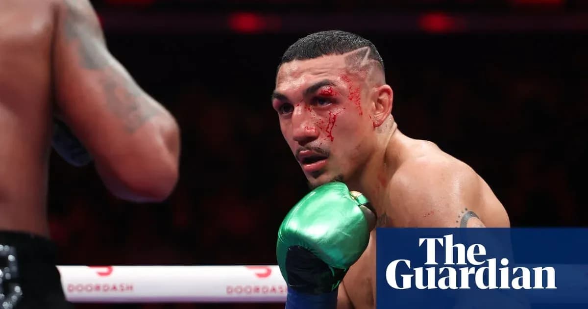 Boxer with blood on face during match Boxer with blood on face during match