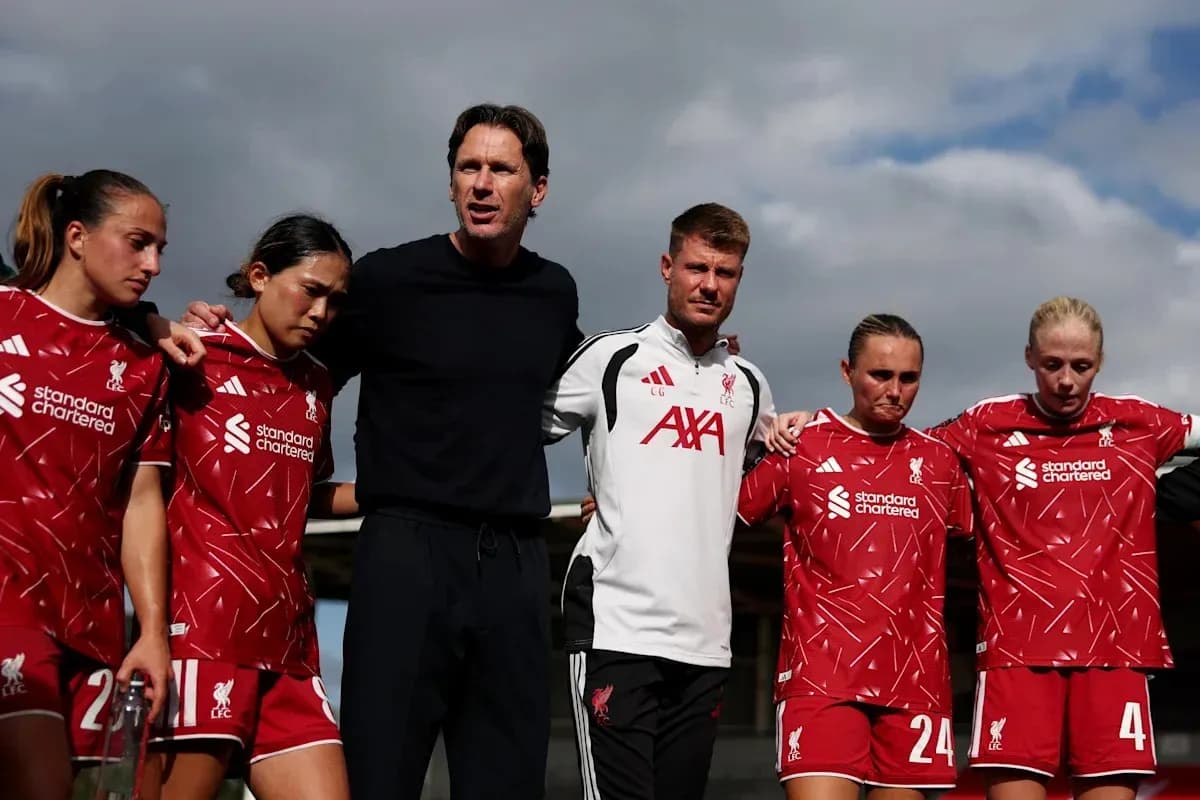 Liverpool women's team gathered for a team huddle Liverpool women's team gathered for a team huddle