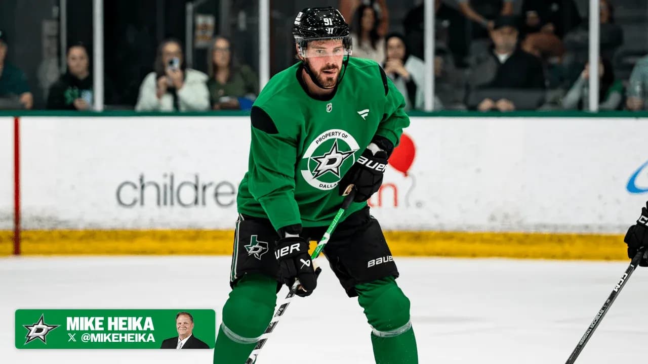 Hockey player practicing on ice rink wearing green jersey Hockey player practicing on ice rink wearing green jersey