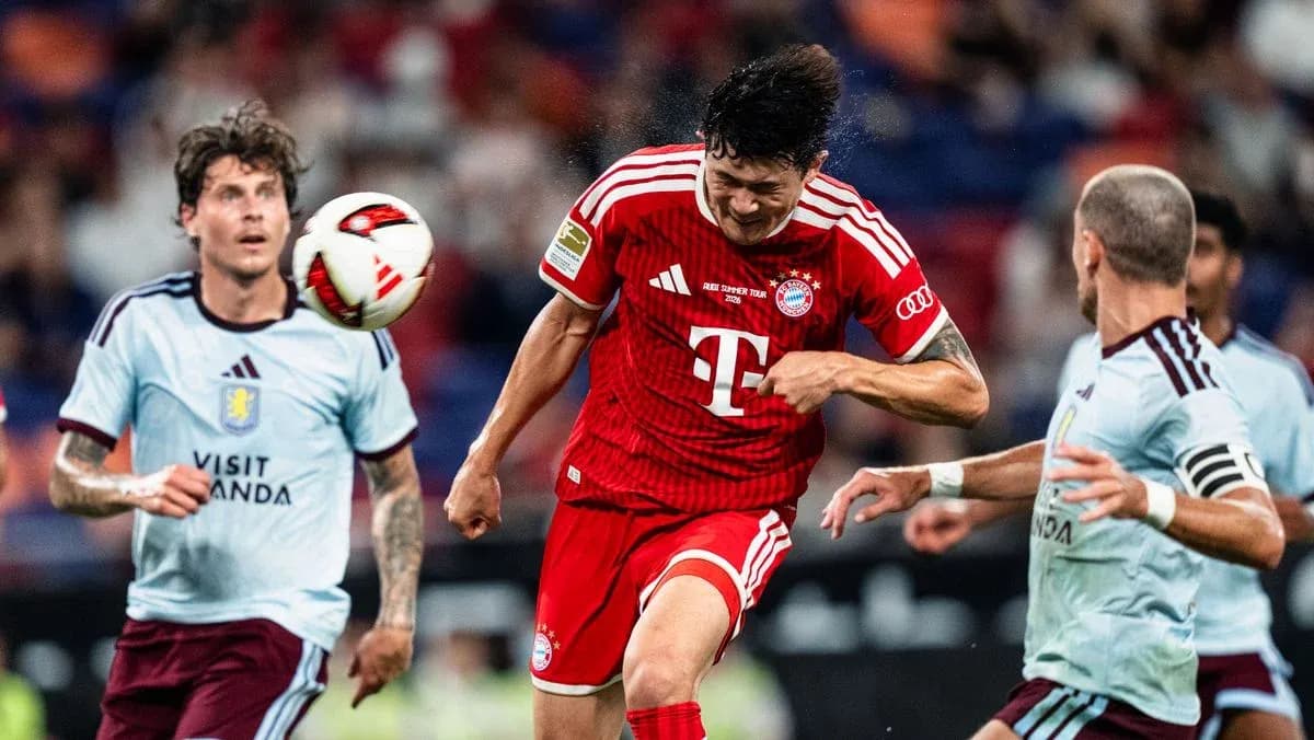 Bayern Munich player heading ball during match Bayern Munich player heading ball during match