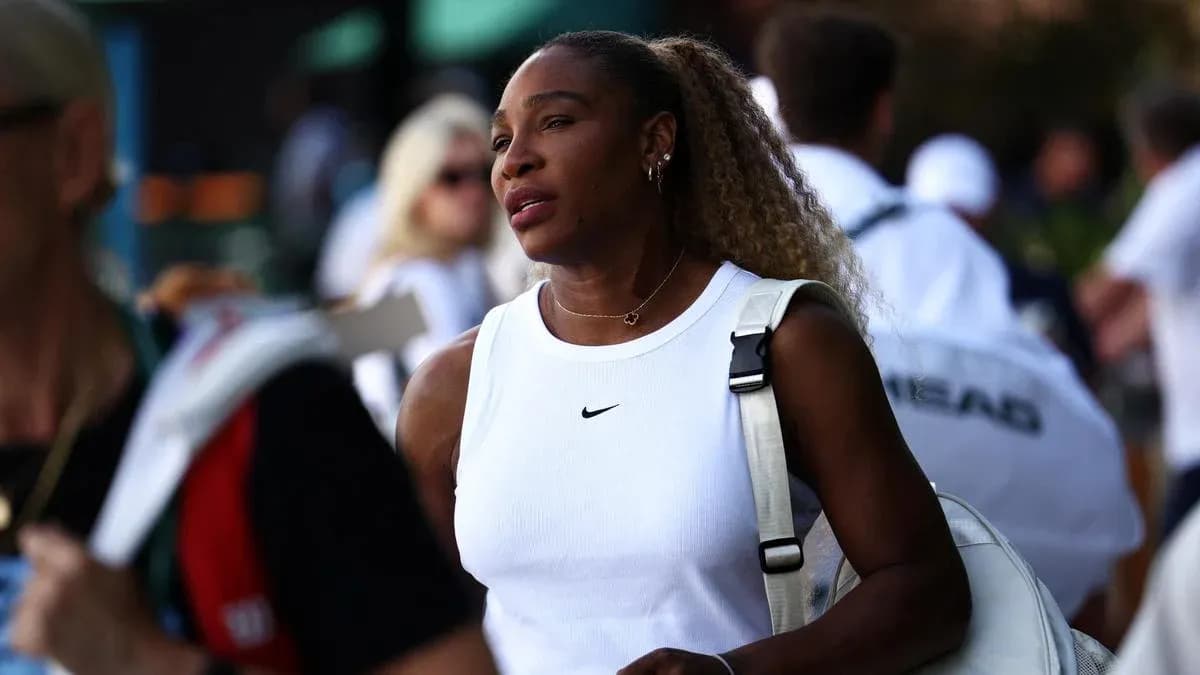 Tennis player walking with bag at event Tennis player walking with bag at event