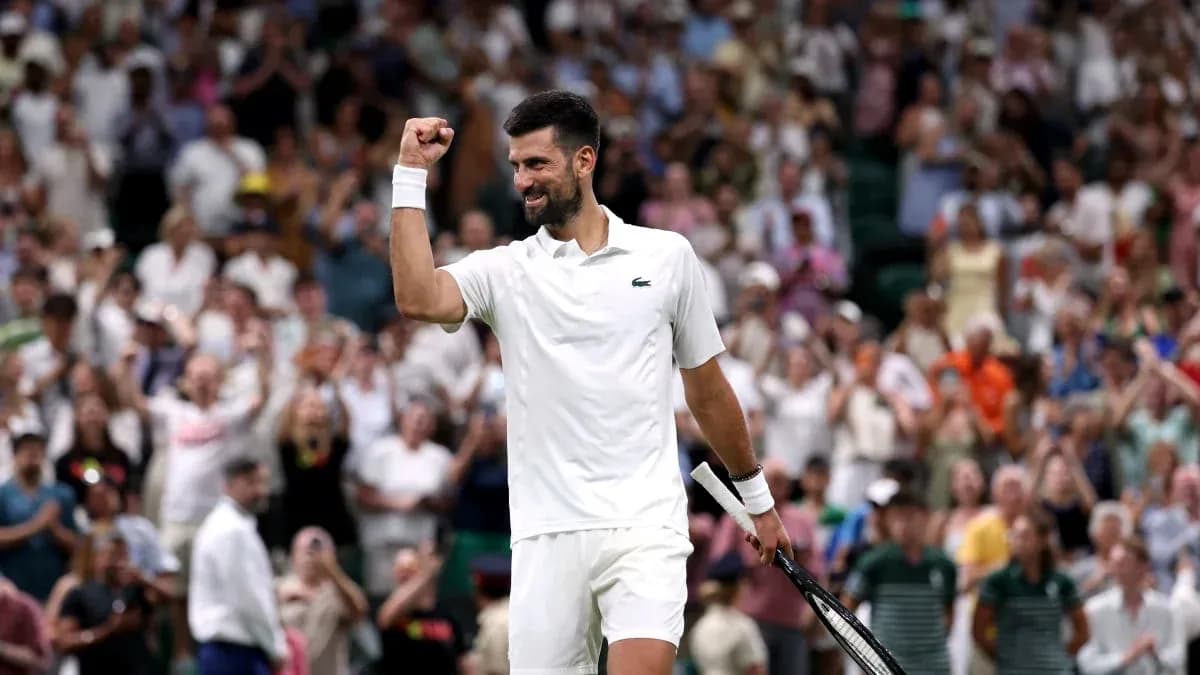 Tennis player celebrating victory at Wimbledon Tennis player celebrating victory at Wimbledon
