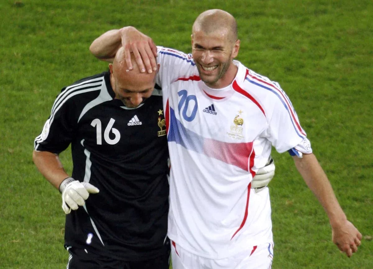 Zinedine Zidane and goalkeeper celebrating together Zinedine Zidane and goalkeeper celebrating together